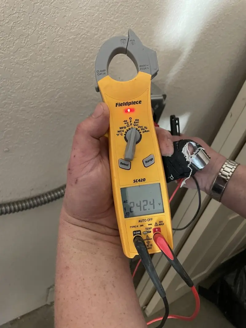 Voltage testing with clamp meter during Generator Installation in Connerton